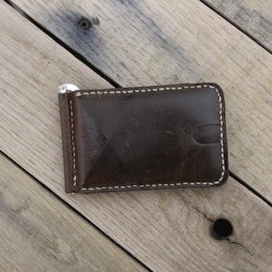 Cartera plegable minimalista con clip para billetes de cuero genuino