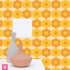 May include: A decorative display featuring two ceramic vases. One vase is light grey, the other is a soft pink. The background showcases a repeating floral pattern in shades of yellow and orange, with a white square tile.