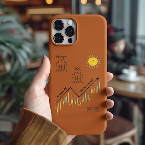 Könnte beinhalten: Ein Set aus drei Keramikbechern mit gesprenkelter, matter Oberfläche. Die Becher sind in Creme-, Hellbraun- und Dunkelbrauntönen gehalten. Jeder Becher hat ein schlichtes, minimalistisches Design.