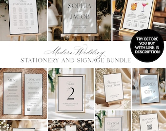 May include: A selection of modern wedding stationery and signage, including table numbers, menus, and welcome signs. The signs feature elegant black and white designs with gold frames and are displayed on easels.