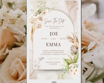 Könnte beinhalten: Eine digitale Save-the-Date-Ankündigung für eine Hochzeit. Die Ankündigung zeigt eine Aquarell-Illustration von Blumen und Grünpflanzen mit einem goldenen Bogen. Der Text lautet "Save the Date" und enthält die Namen Joe und Emma, das Datum und die Uhrzeit der Hochzeit sowie den Ort der Zeremonie und des Empfangs.