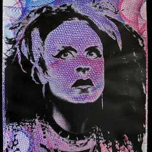 May include: A black and white portrait of a person with dark hair and a black choker necklace. The background is a purple and blue patterned design.