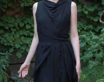 Vintage 50s black sleeveless wiggle dress with overlay fabric strips pleats that create movement