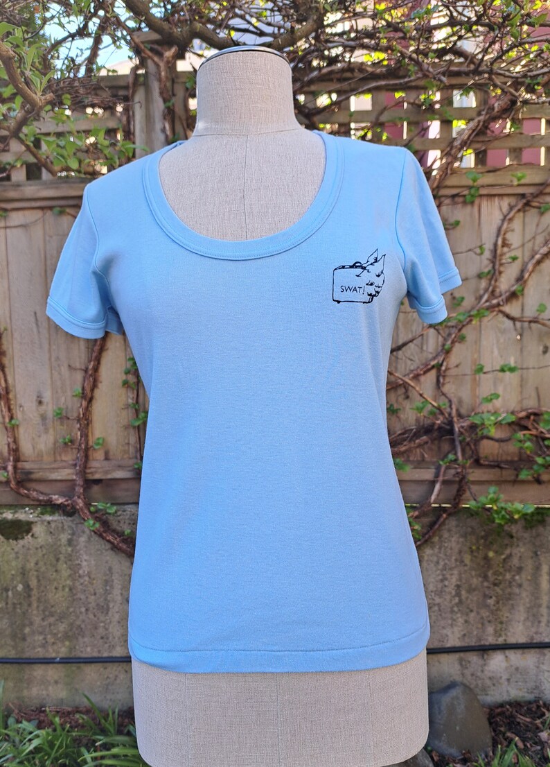 Vintage 70s baby blue Swat logo women's tee shirt image 1