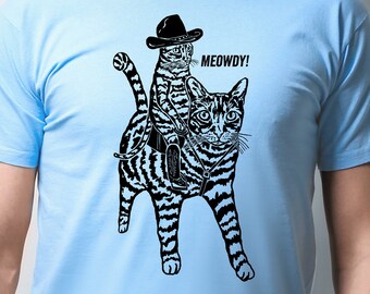 T-shirt chat miaou : équitation de chat de cow-boy, chemise d'art du Texas