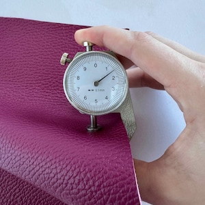 up close of the grape leather showing the thickness
