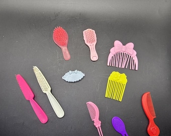 Vintage lot of Barbie Hair Brushes Combs Hair Accessories