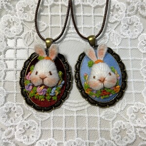 Bunny and flower motif necklace made with cotton thread and antique-style pendant base, styled for daily wear or gifting.