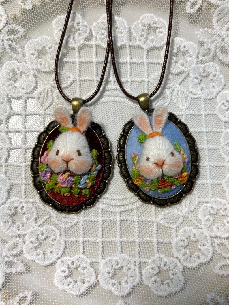 Bunny and flower motif necklace made with cotton thread and antique-style pendant base, styled for daily wear or gifting.