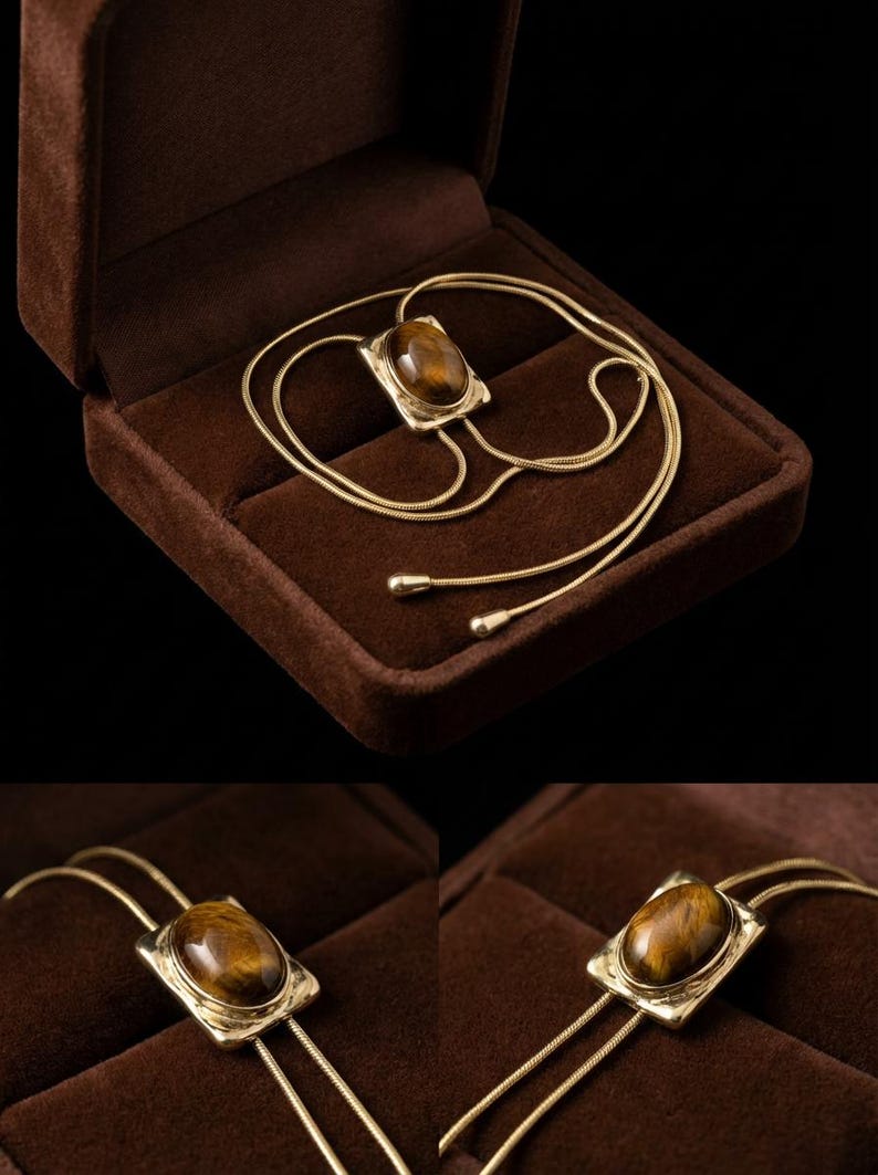 Women’s western bolo tie necklace displayed as vintage inspired jewelry combining minimalist gold chain and tiger eye pendant.