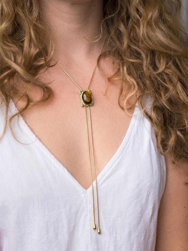 Vintage western style necklace with tiger eye stone centerpiece inspired by classic cowgirl bolo tie jewelry.