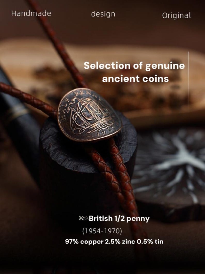 May include: A close-up of a British 1/2 penny coin from 1959, mounted on a dark brown leather cord. The coin features a sailing ship design and the text "Selection of genuine ancient coins". The text "Handmade", "design", and "Original" are also visible.