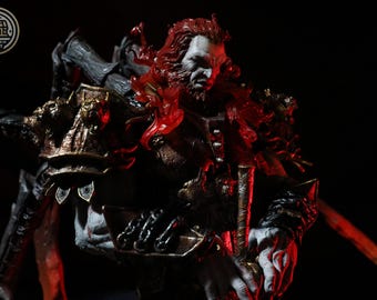 May include: A red-haired warrior figure with a fierce expression, wearing intricate armor and holding a sword. The figure is posed in a dynamic stance, with a dramatic red and black color scheme.