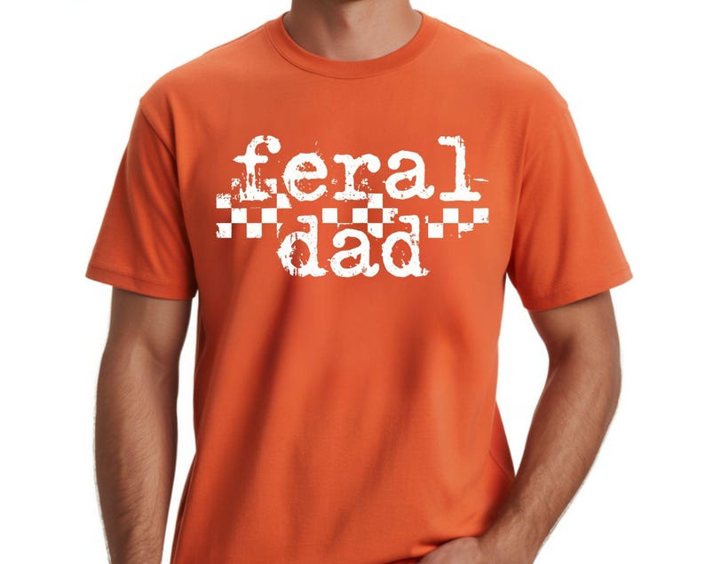 An orange t-shirt with the text "feral dad" printed on it.