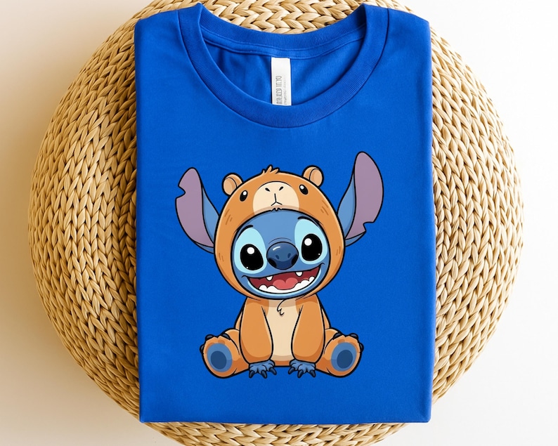 A blue t-shirt with a cartoon character wearing a bear costume.