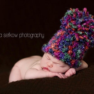 Wild Berries Pom Pom Hat in Pink Purple Orange Teal