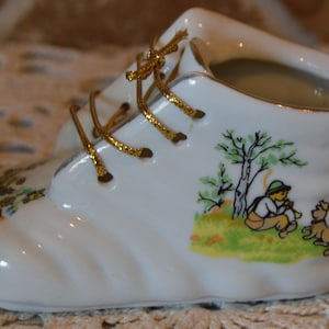 Adorable Porcelain Baby Shoe~Enesco~Girl Playing Instrument For Her Dog~Butterflies And Floral Toe~Printed Both Sides