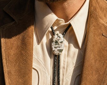 Handmade Black & White Oval Ocean Jasper Bolo Tie , Dark Green Leather Cord – Copper Bar Tips