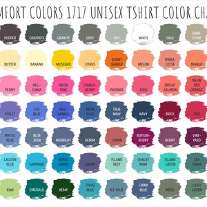 Peut inclure: Nuancier de couleurs pour t-shirts unisexes Comfort Colors 1717. Le tableau pr&eacute;sente une large gamme de couleurs, dont le noir, le gris, le blanc et diverses nuances de bleu, de rose et de vert. Le texte "COMFORT COLORS 1717 UNISEX TSHIRT COLOR CHART" est en haut.