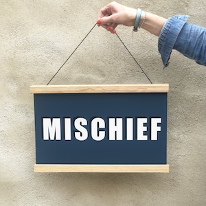 MISCHIEF Hanging Poster Print In Navy