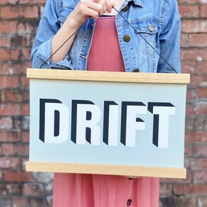 DRIFT Hanging Poster Print In Soft Blue