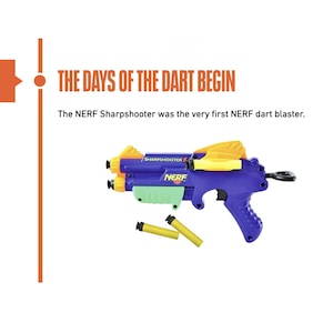 May include: A blue, yellow, and green NERF Sharpshooter dart blaster with three yellow darts. The text reads "THE DAYS OF THE DART BEGIN" and "1992". The timeline indicates the 2000s.