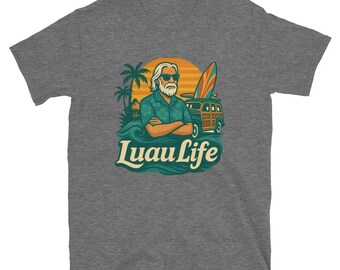 May include: Gray t-shirt featuring a graphic of a man with sunglasses, a surfboard, and a vintage van. The design includes the text "Luau Life" in a tropical style, with palm trees and ocean waves.