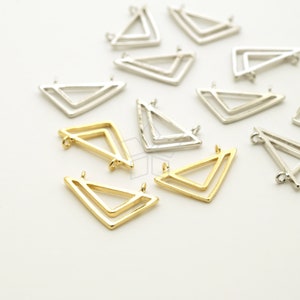 May include: A group of gold and silver double triangle pendant charms. The charms are made of metal and have a geometric design.