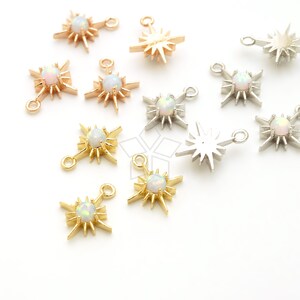 May include: Assortment of gold, silver, and rose gold star-shaped charms with opal stones. Each charm has two jump rings for attaching to jewellery.