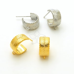 May include: Three pairs of earring hoops with a chevron pattern. The hoops are available in gold and silver.