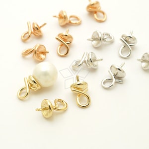 Può includere: Assortimento di cappucci per perle in metallo dorato, argentato e oro rosa con un anello laterale. I cappucci per perle sono progettati per essere utilizzati con perle o altre perle.
