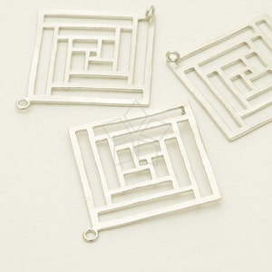 May include: Three silver metal square-shaped charms with a geometric design. Each charm has a loop at the top for attaching to jewellery or other crafts.