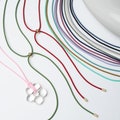 WR68 / 1 pcs - Adjustable Length Color Braided Silky Rope Cord Necklace with Gold Plated Clasp and End Caps Ready to Wear product logo