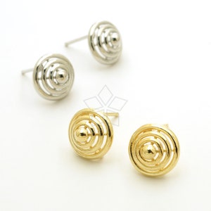 May include: A pair of earrings with a circular design. One pair is gold and the other is silver.