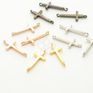 May include: Assortment of gold, silver, and rose gold cross charms with jump rings. The charms are perfect for jewelry making and crafting.