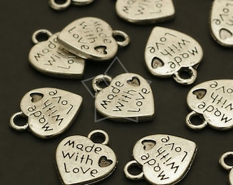 May include: Silver heart-shaped charms with the text "Made with Love" on each charm. The charms have a loop at the top for attaching to a necklace, bracelet, or other jewelry.