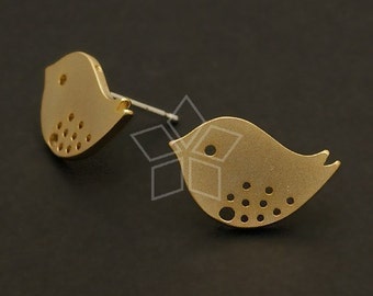 May include: A pair of gold-toned bird-shaped earrings. Each earring features a cutout design with a dotted pattern.