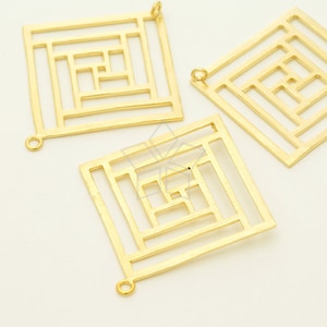 May include: Three gold metal square-shaped charms with a geometric design. Each charm has a loop at the top for attaching to jewellery.