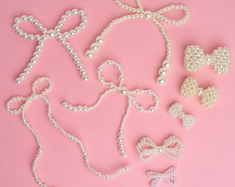 AR395 / 1 pieza - Borlas de nudo de pajarita de perlas hechas a mano, hallazgos de joyería de cinta con cuentas de perlas acrílicas, fabricación de collares de bowknot de moda