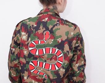 Vintage army camo jacket with hand-embroidered snake and rose tattoo