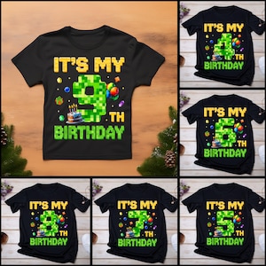 Könnte beinhalten: Schwarze T-Shirts mit dem Text "IT'S MY 9TH BIRTHDAY" in gelber und grüner Pixel-Schrift. Die Zahl 9 ist grün und pixelig, mit Geburtstagskuchen und Luftballons. Andere Shirts zeigen die Zahlen 4, 5, 6, 7 und 8.