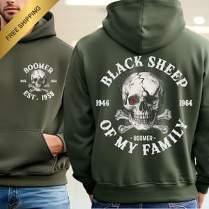 May include: Dark green hoodie with a front pocket and a hood. The front has a skull graphic and the text "BOOMER EST. 1958". The back displays a skull graphic with the text "BLACK SHEEP OF MY FAMILY - BOOMER - 1946 1964".
