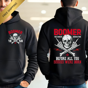 May include: Black hoodie with a skull and crossbones graphic. The front of the hoodie has the word "BOOMER" above a skull and the numbers "19" and "58". The back of the hoodie has the words "BOOMER THE BADASS GENERATION" above a skull and the text "BEFORE ALL YOU SISSIES WERE BORN".