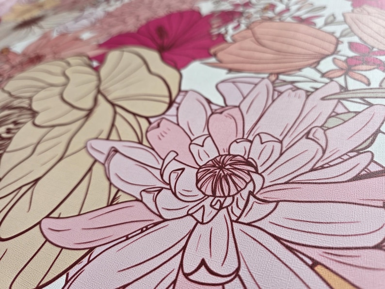 May include: Close-up of a pink and white floral print with a detailed design. The flower has a pink center and white petals with a delicate outline.