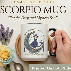 May include: White ceramic Scorpio mug with a black handle and rim. The mug features a whimsical illustration of a duck in a cloak and hat, with the text "The Scorpio Wellness Society" and "My chart says I'm not dramatic."