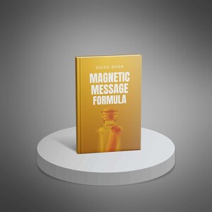 May include: A hardcover guide book titled "MAGNETIC MESSAGE FORMULA" with a gold cover. The cover features an illustration of a bottle with a scroll inside. The book is standing on a white, round pedestal.