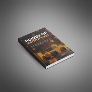 May include: A hardcover book titled "POWER OF PROTOTYPES" with a yellow off-road vehicle illustration on the cover. The book's cover also includes the text: "Turn your ideas into reality by prototyping to test, refine, and validate concepts for business success."