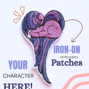 May include: An iron-on embroidery patch shaped like a heart with wing-like details. The patch has a design in purple, blue, and pink. Text on the patch reads "YOUR CHARACTER HERE!" and "IRON-ON embroidery Patches".