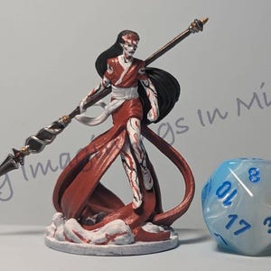 May include: A set of three ceramic mugs with a speckled, matte finish. The mugs are in shades of cream, light gray, and dark gray. Each mug has a simple, minimalist design, perfect for coffee or tea.