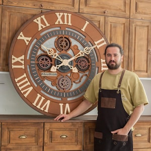 Jättestor väggklocka | Extra stor väggklocka | 145 cm grön och kopparfärgad väggklocka | wanduhr groß xxl | receptionsområde | Statement-inredning
